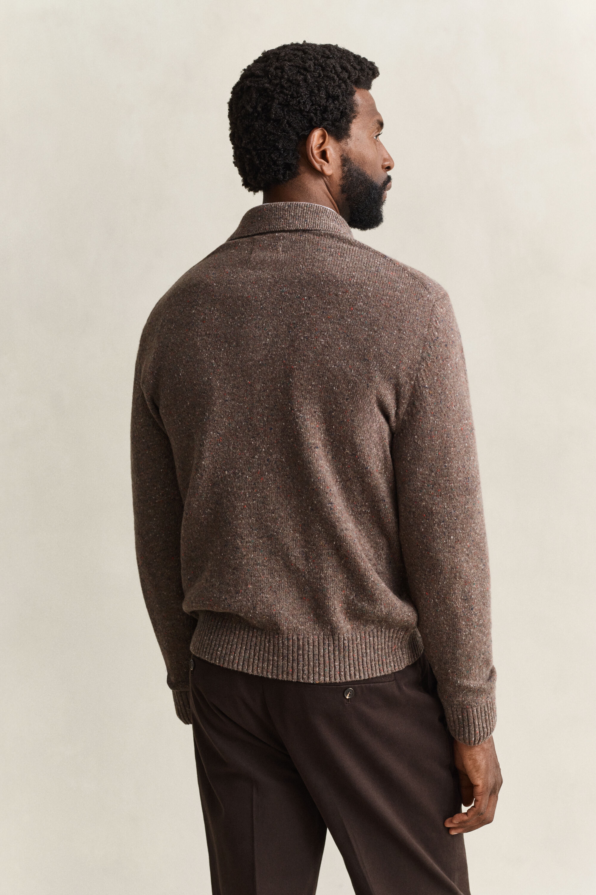 Pull façon polo en laine mouchetée mélangée