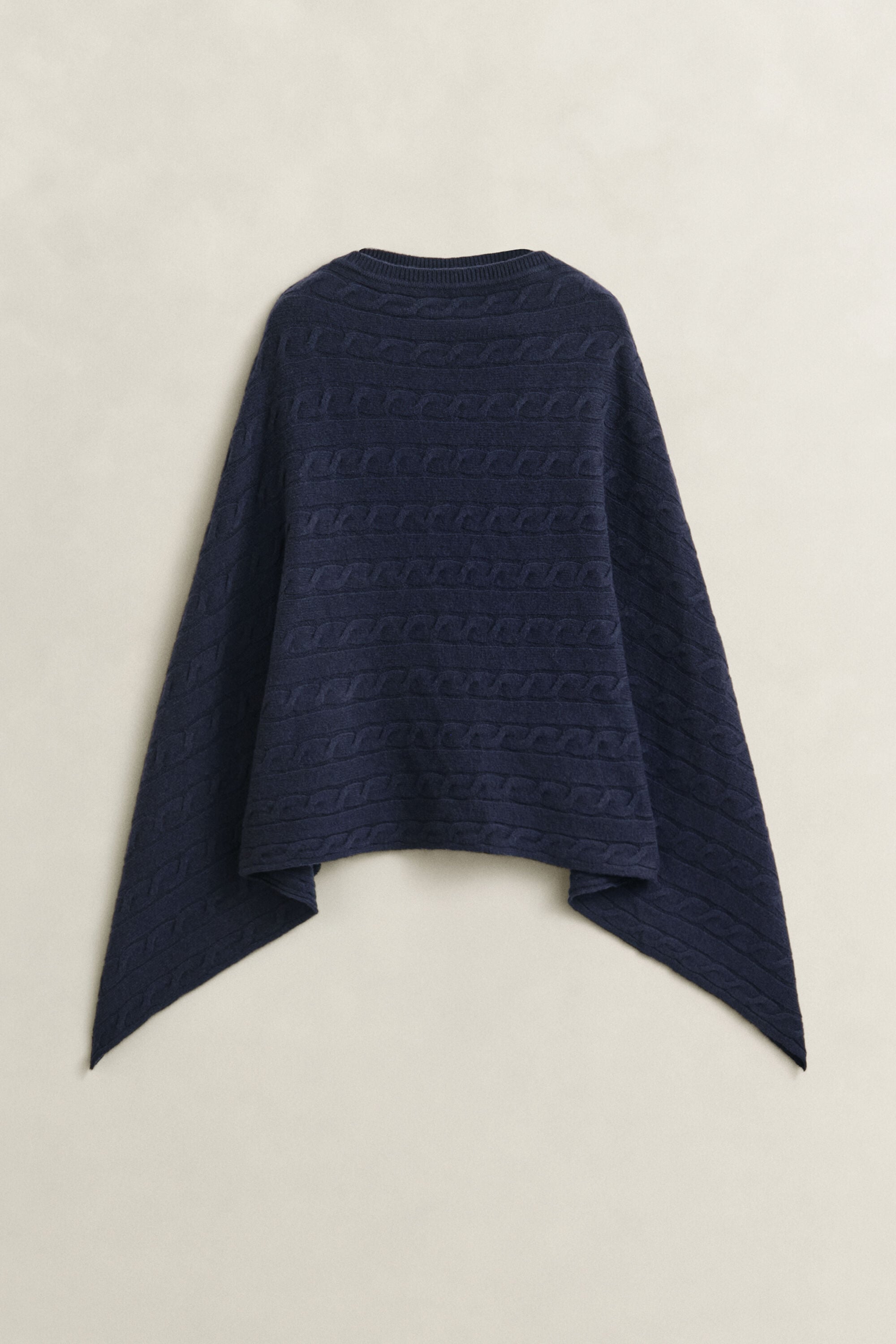 Poncho a trecce in lana