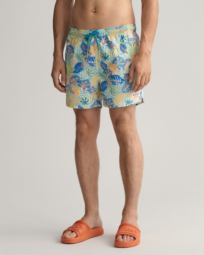 Classic Fit Badeshorts mit tropischem Print