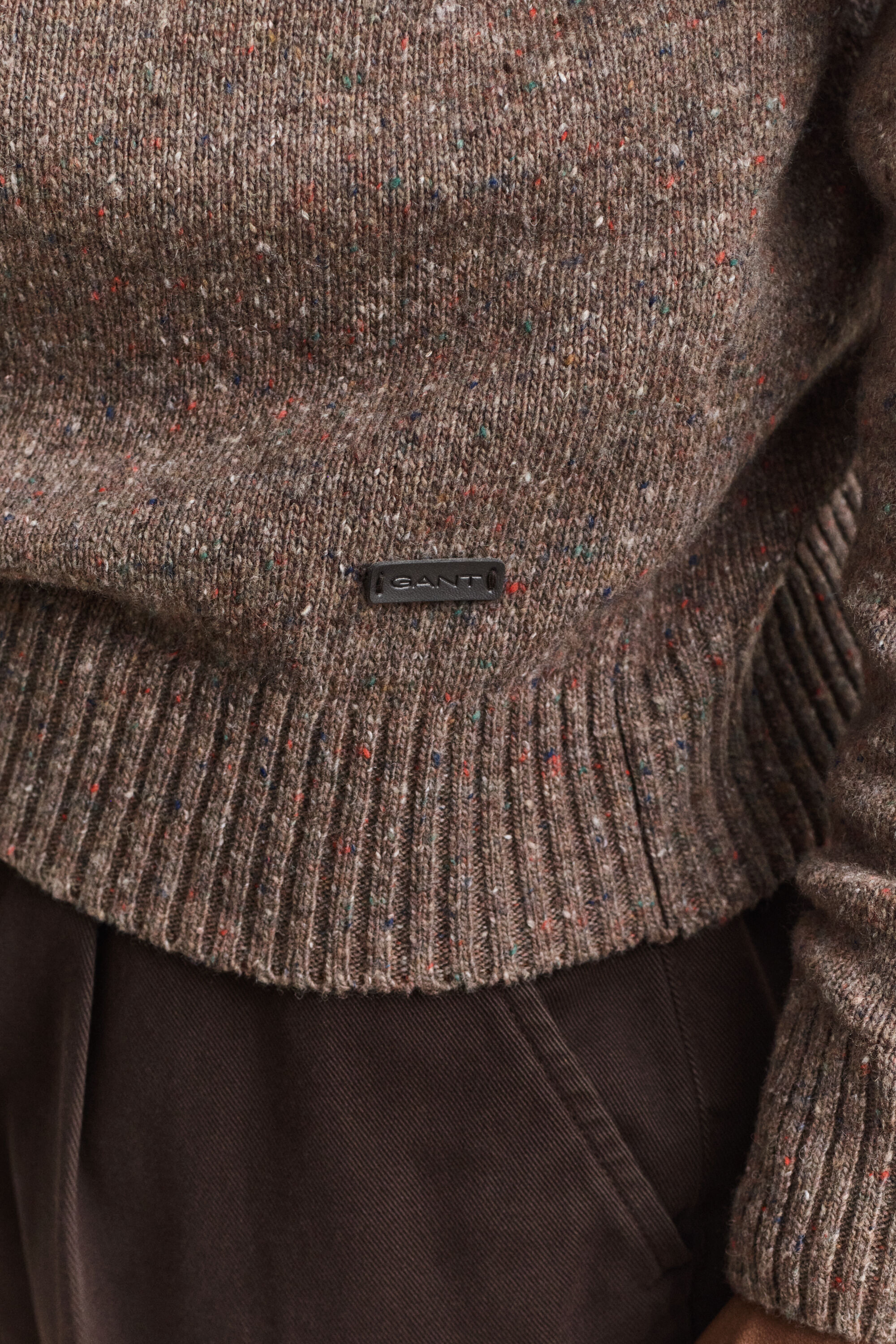 Pull façon polo en laine mouchetée mélangée
