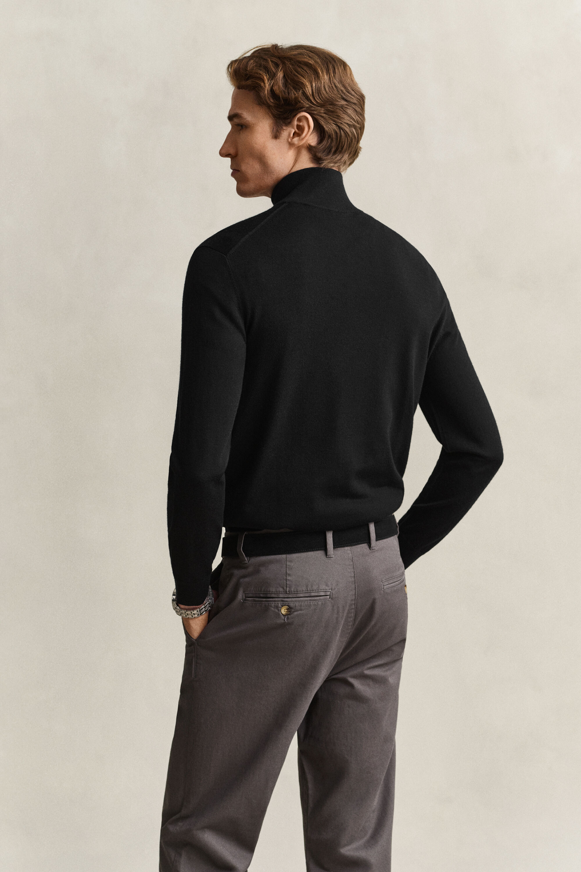 Maglia in lana merino a coste con zip corta