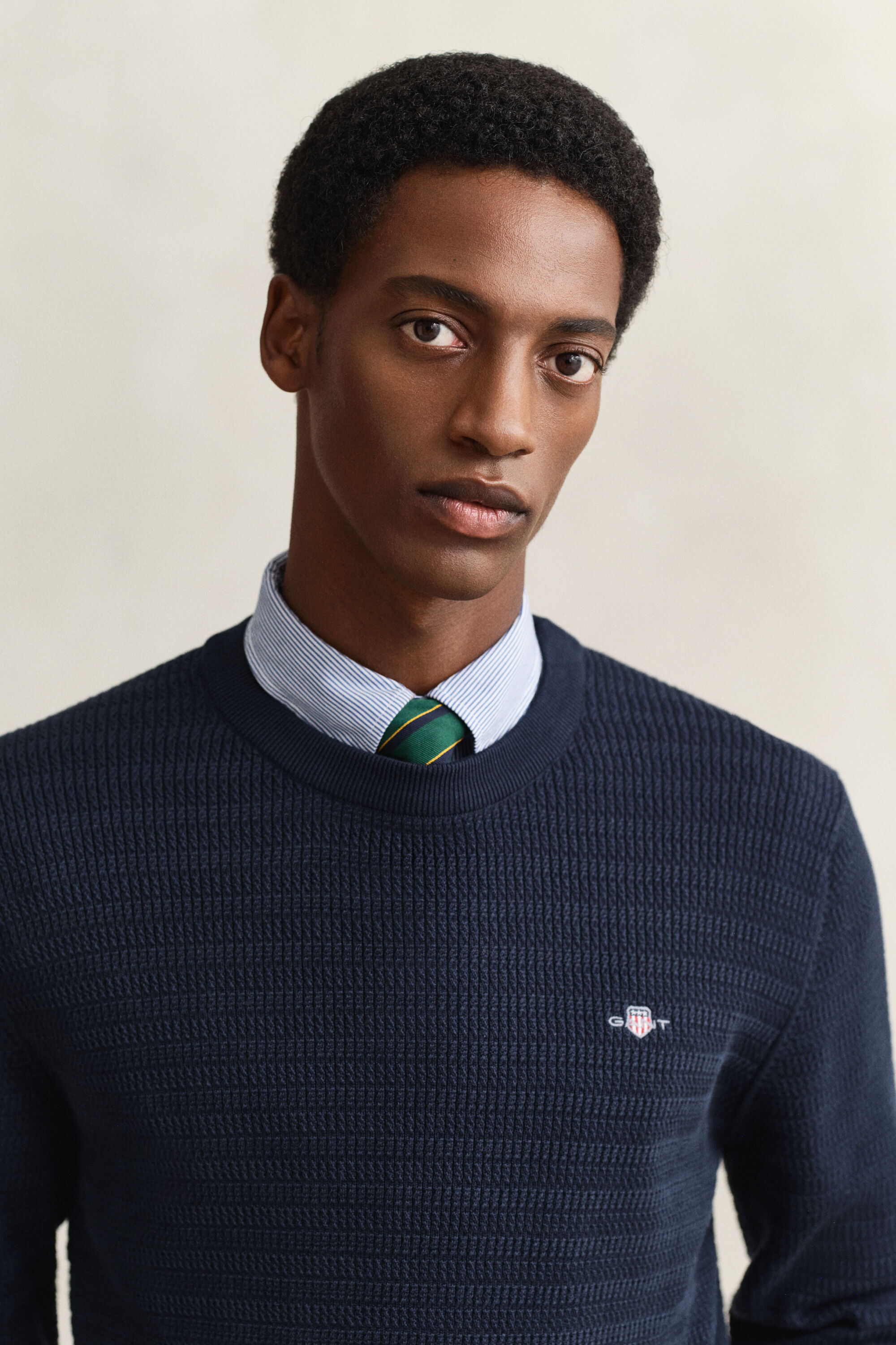 Maglia girocollo a mini trecce