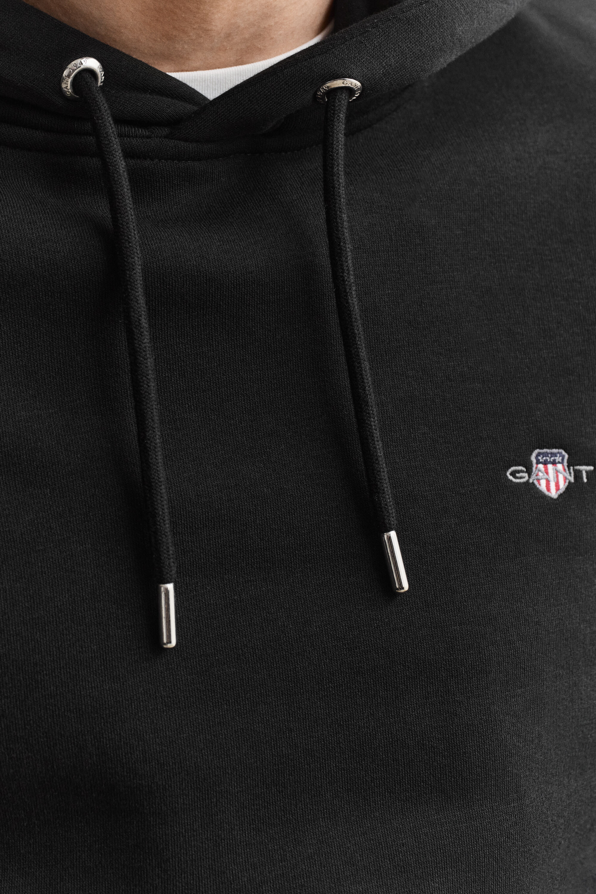 Sweat à capuche avec écusson