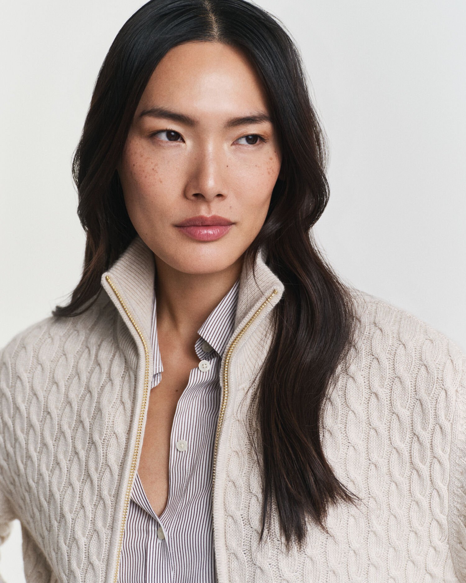 Cardigan con zip lavorato a trecce