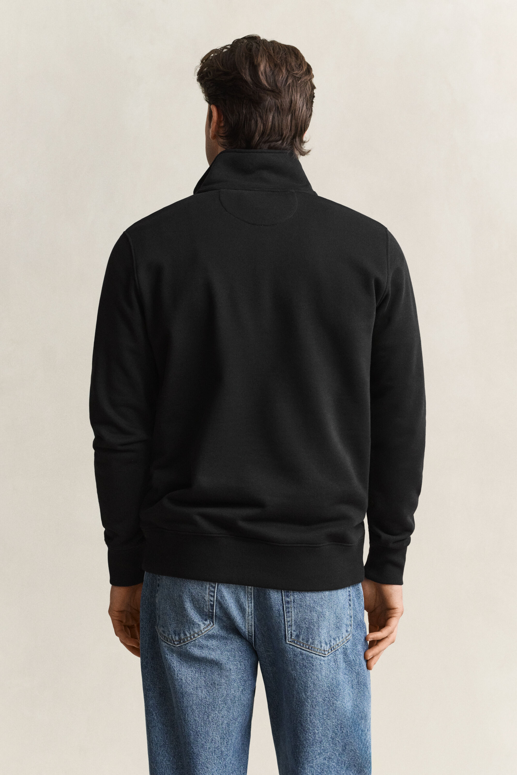 Sweat-shirt à demi-zip avec écusson