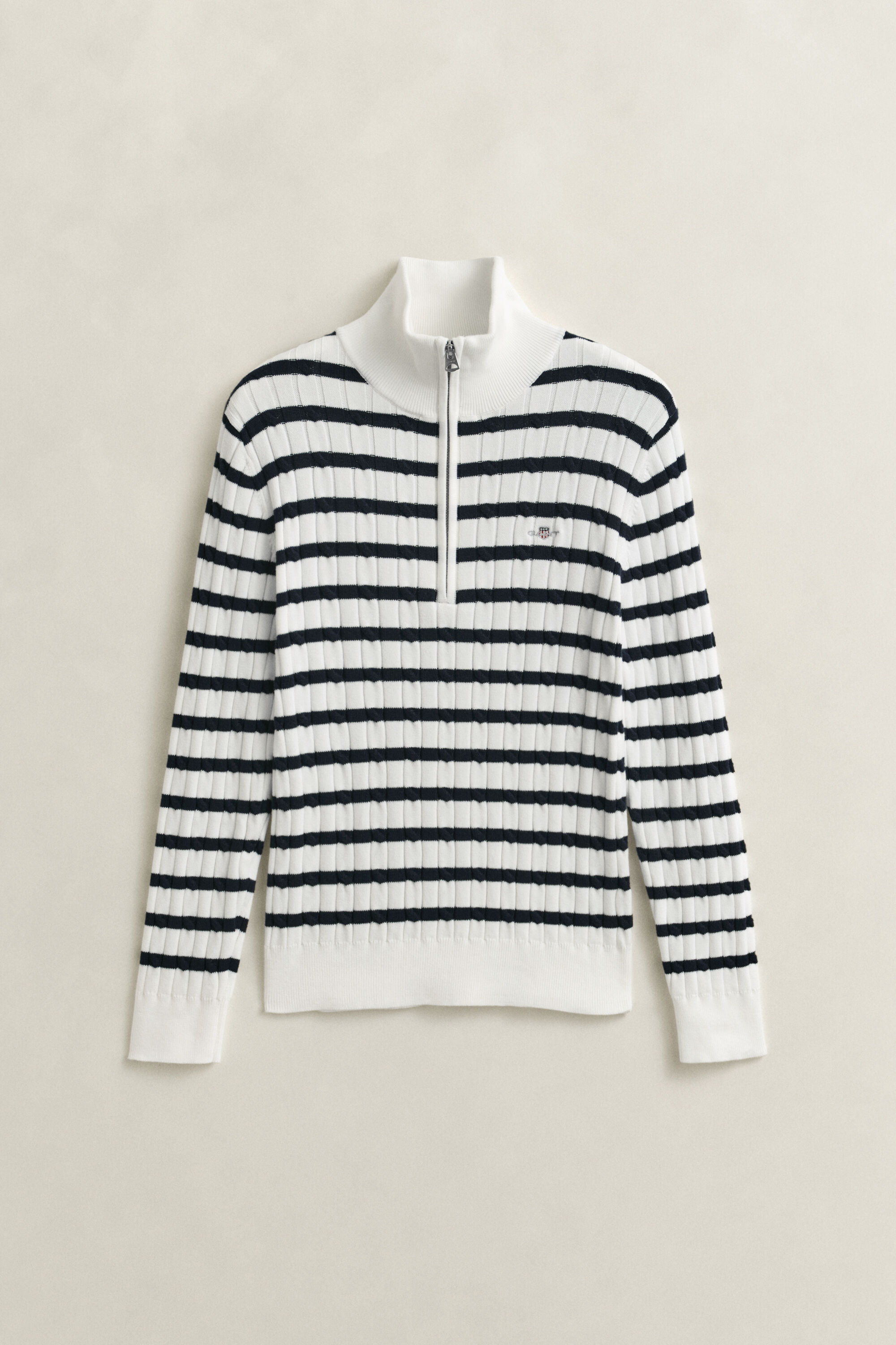 Maglia a righe con trecce e zip corta
