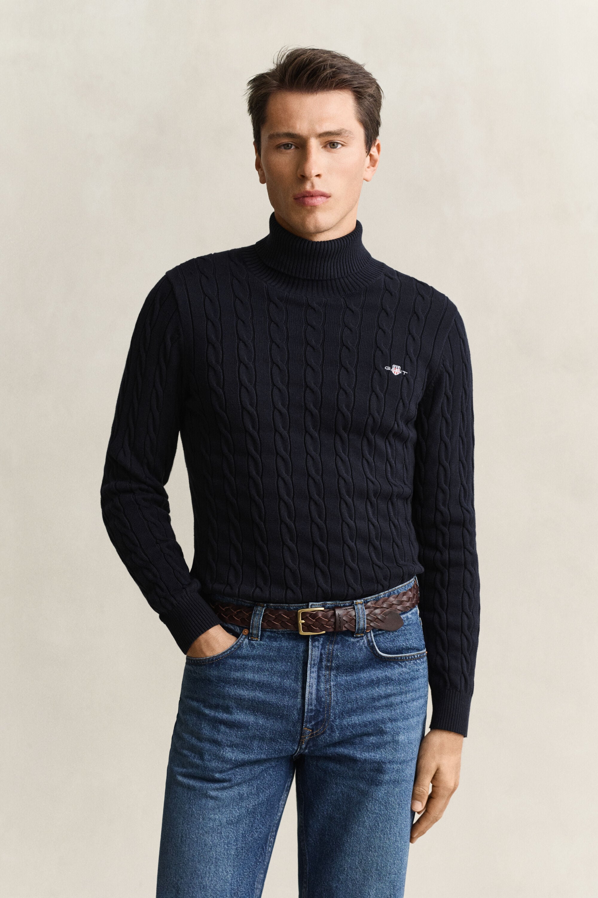 Maglia a collo alto in cotone a trecce