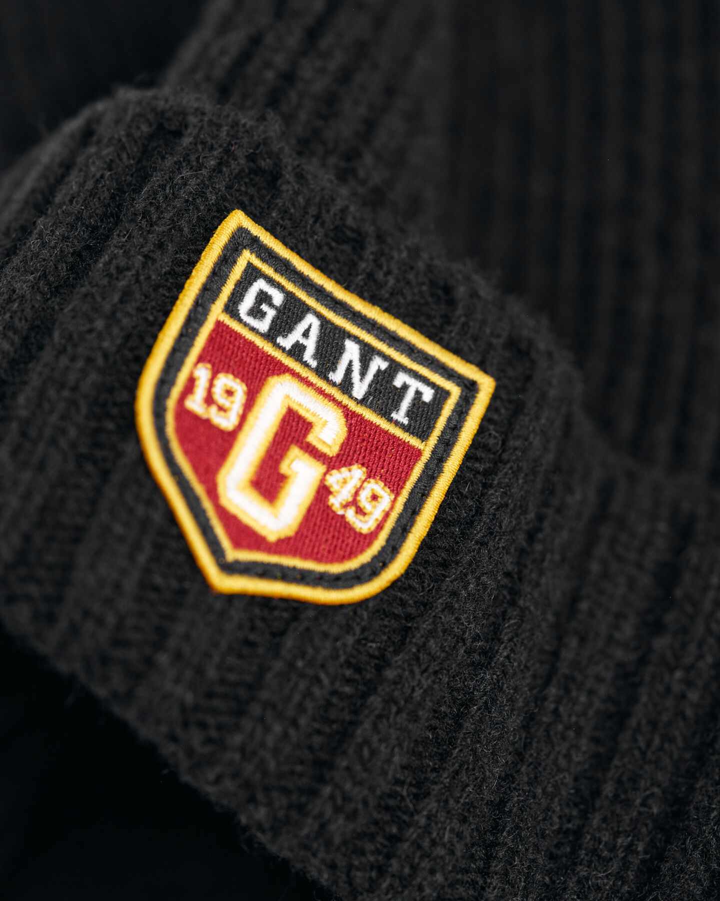 Woll Beanie mit Badge
