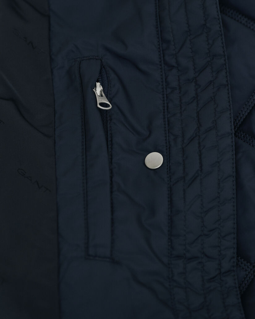 Gesteppter Mantel mit Cordbesatz