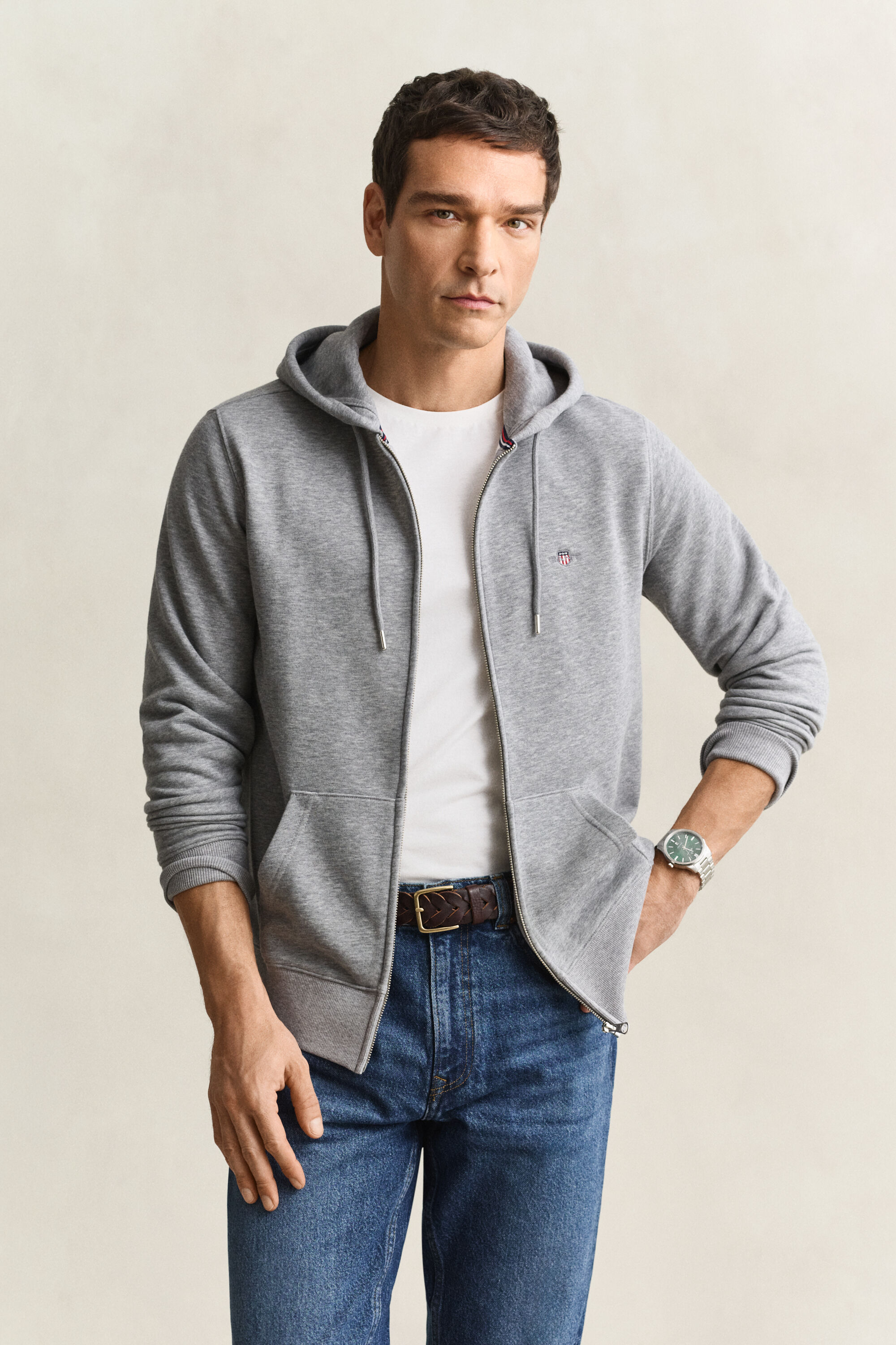Sweat à capuche zippé avec écusson