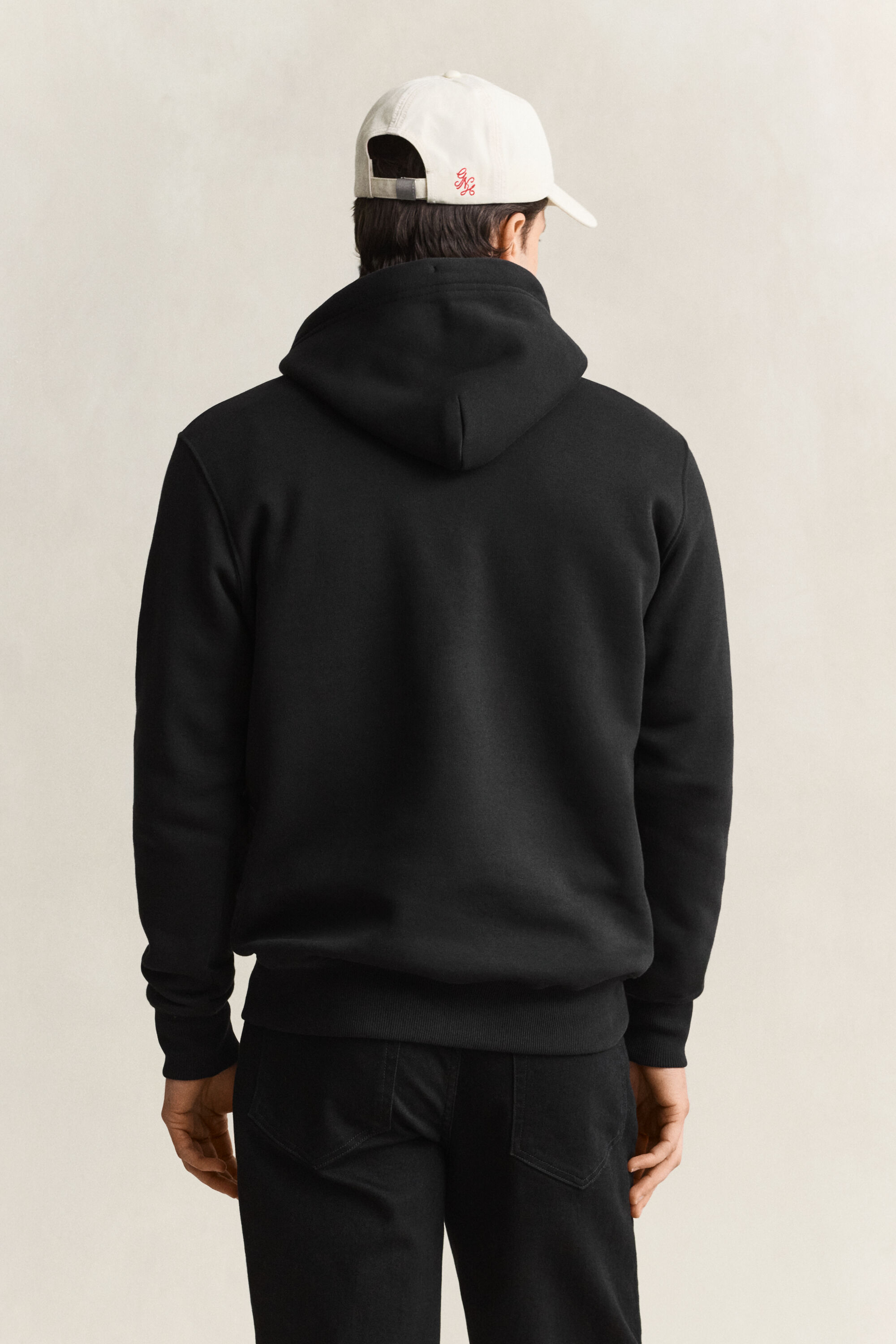 Sweat à capuche avec écusson