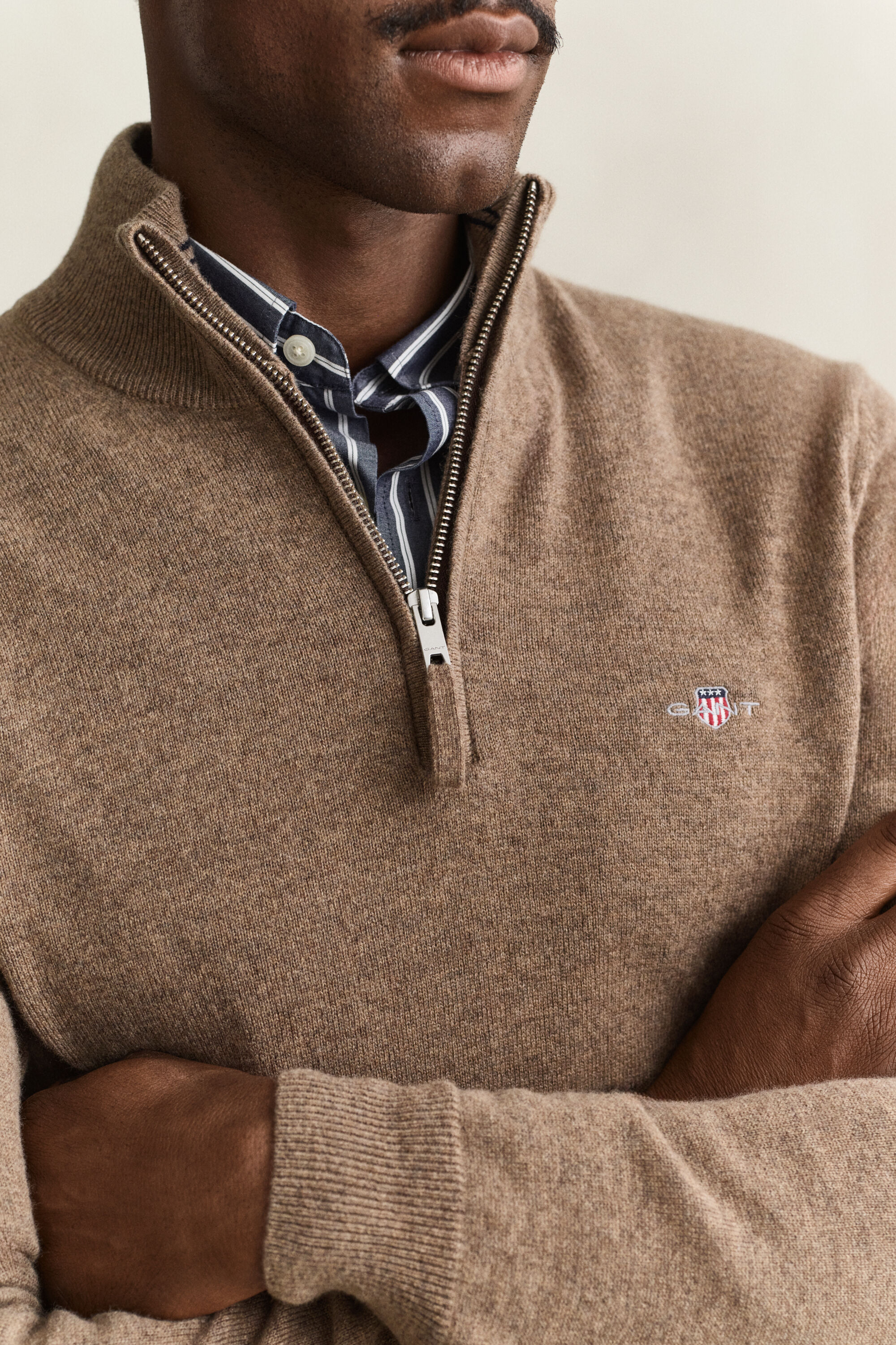 Maglia in lana d’agnello con zip corta
