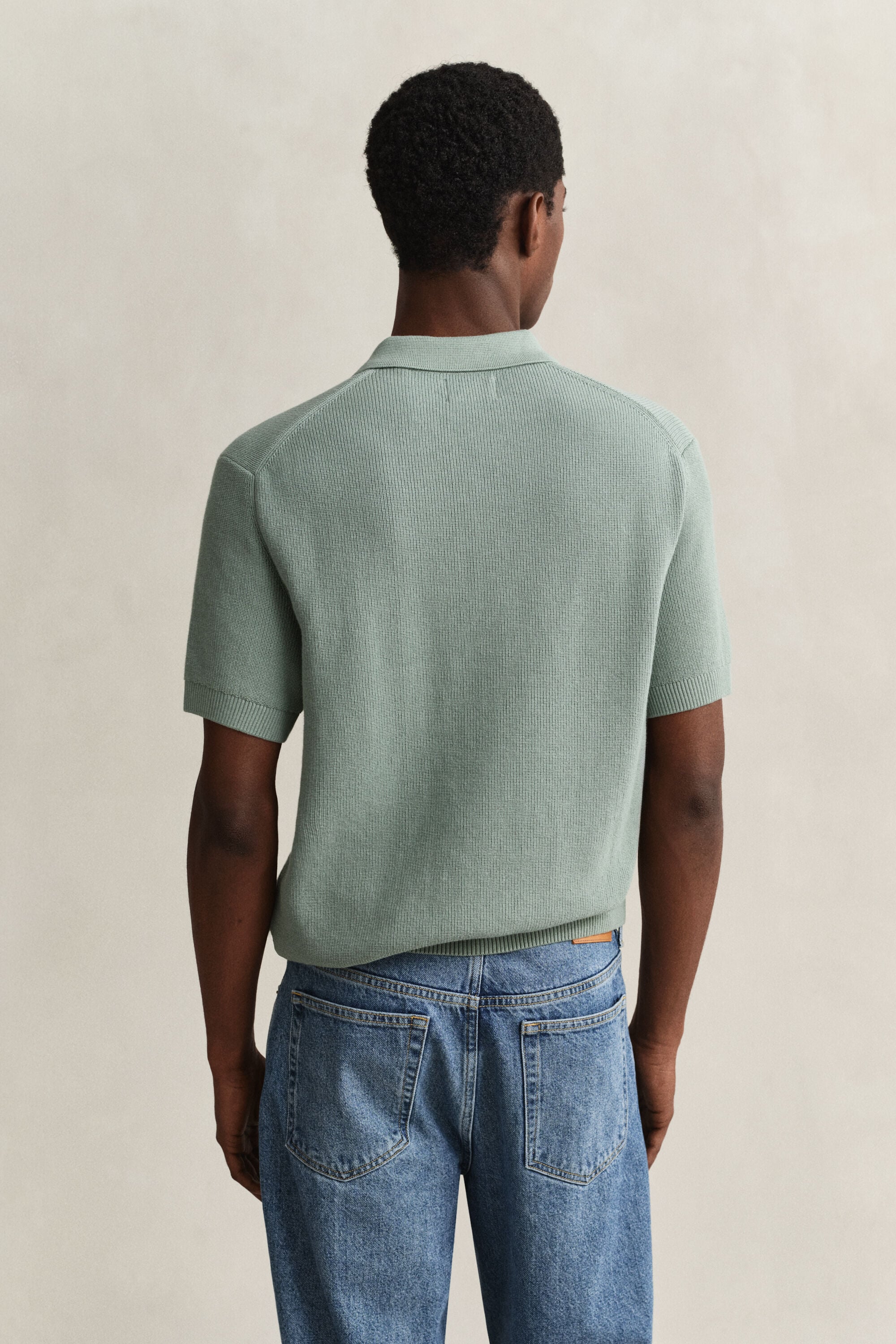 Pull façon polo en coton côtelé