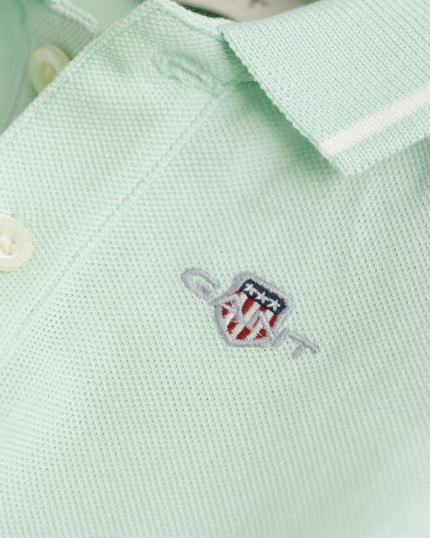 Baby Piqu&eacute; Body mit kontrastierenden Randstreifen