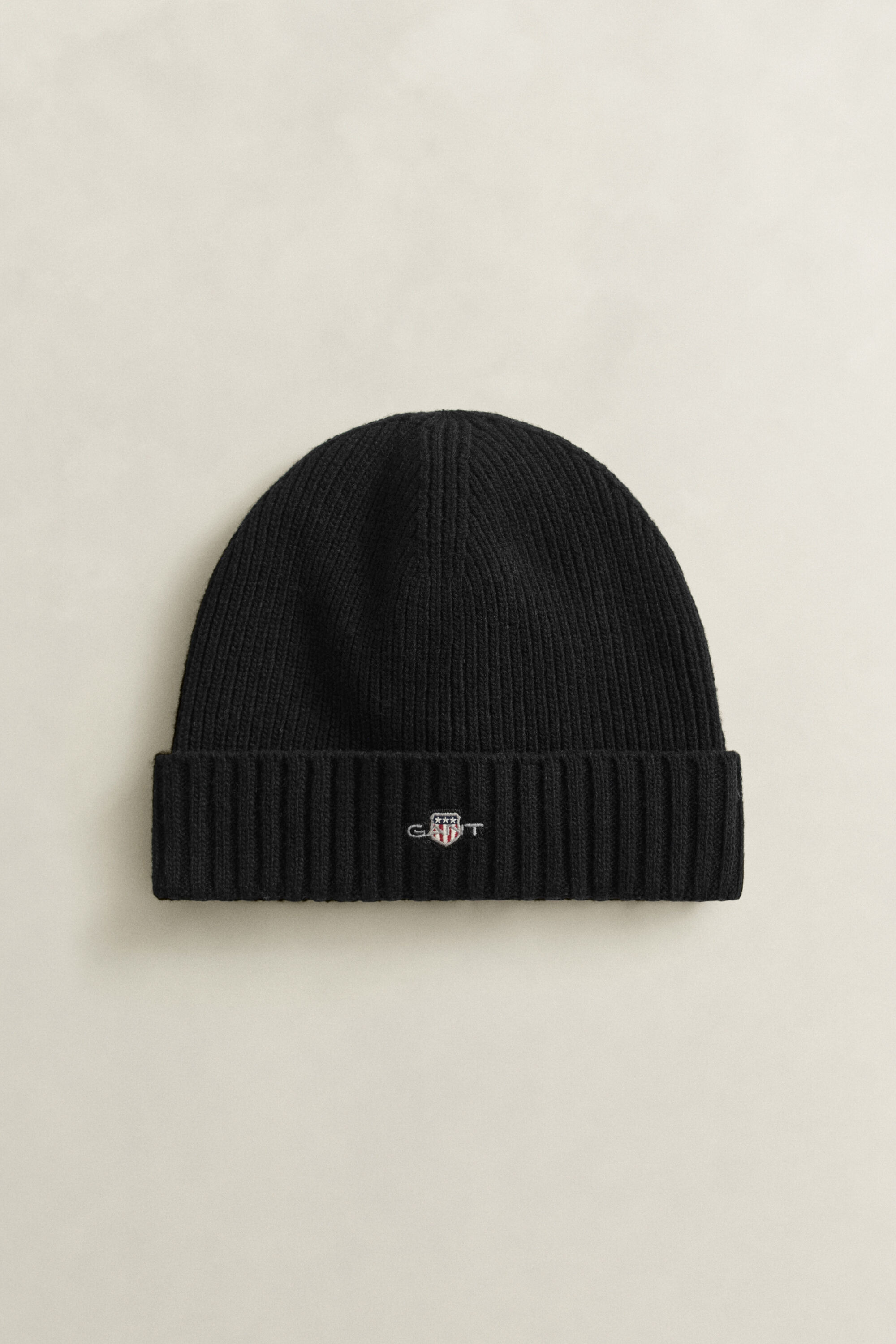 Bonnet en laine avec écusson