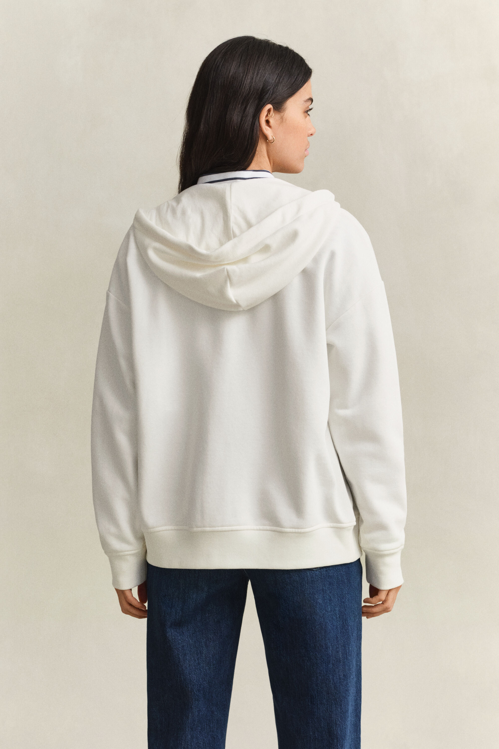 Sweat à capuche zippé avec écusson