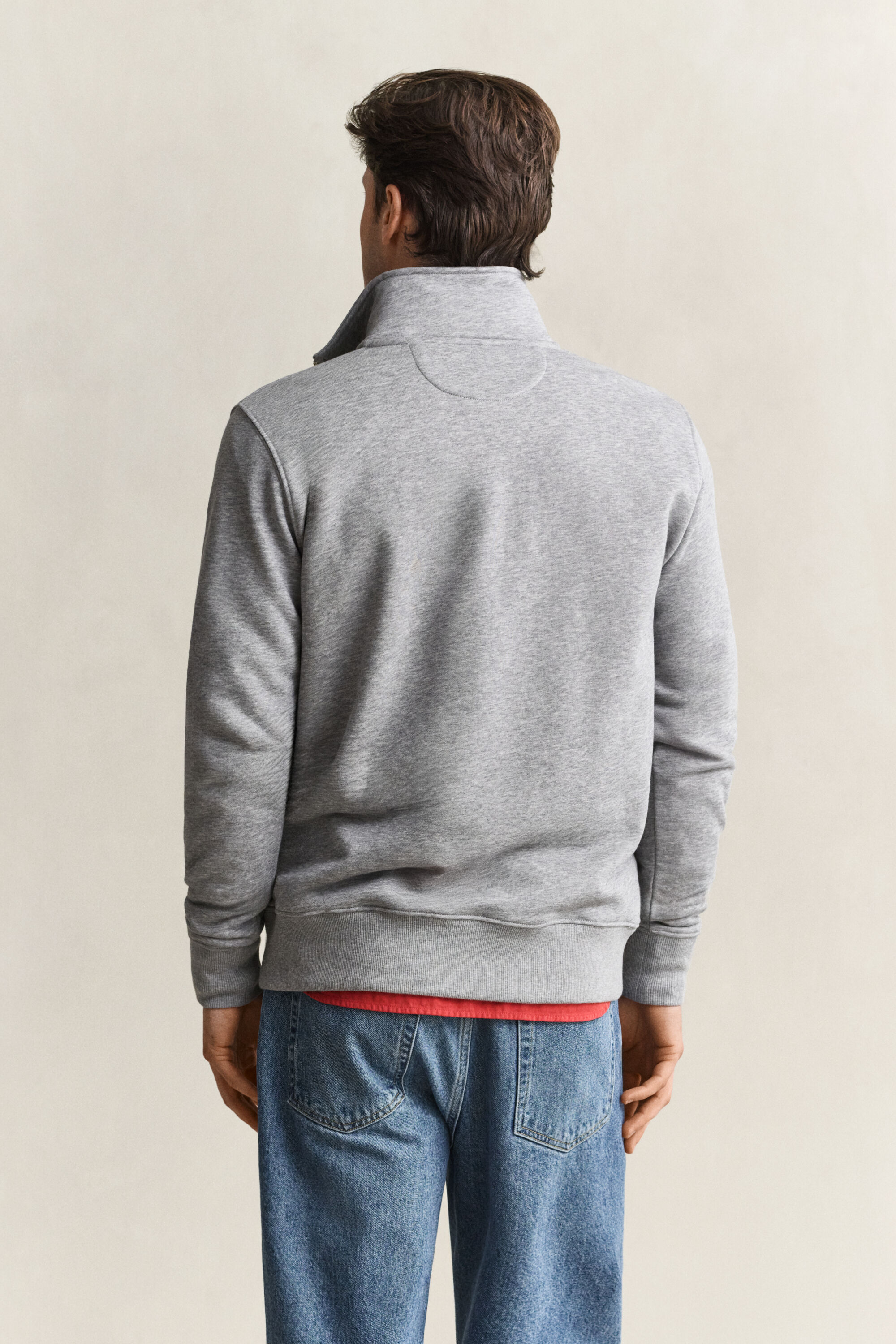 Felpa Shield con zip corta