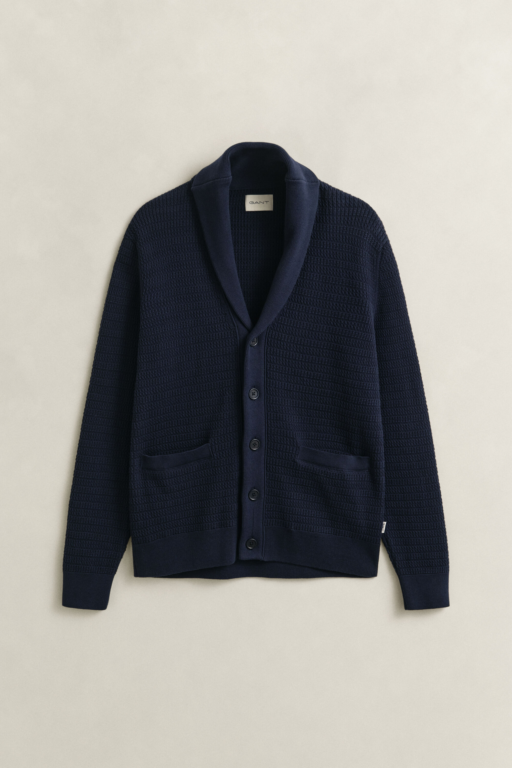 Cardigan con collo sciallato in maglia a trecce