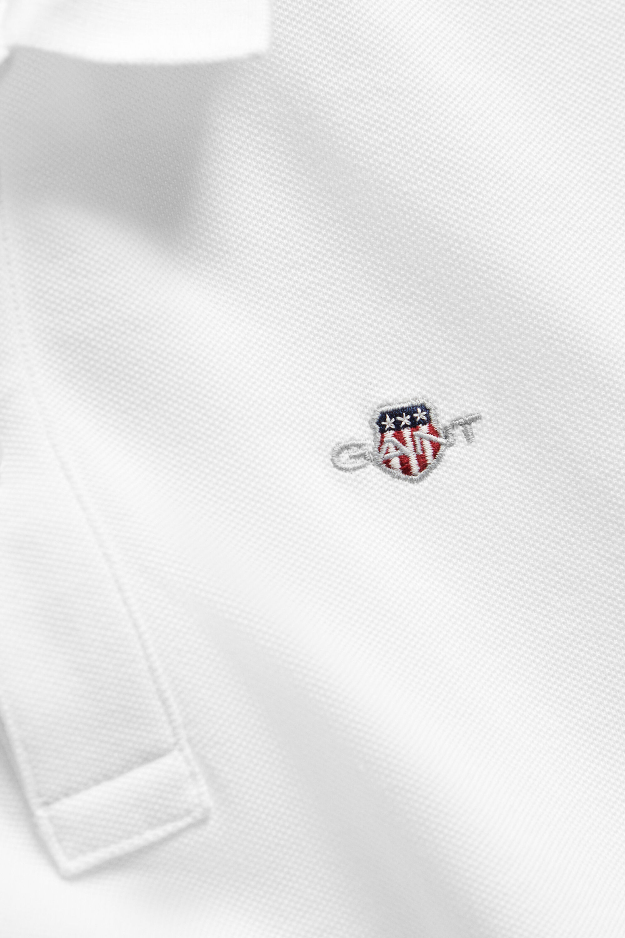 Polo en coton piqué Shield Ado