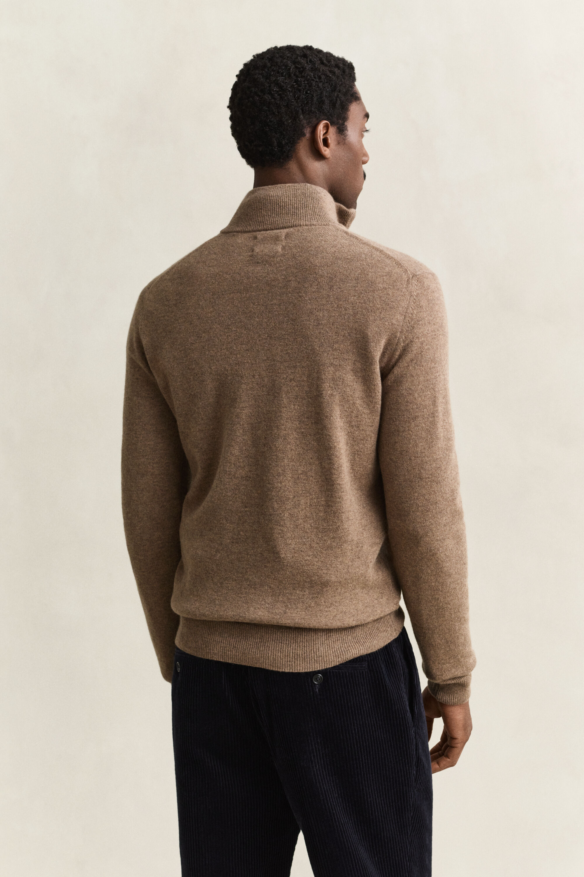 Maglia in lana d’agnello con zip corta