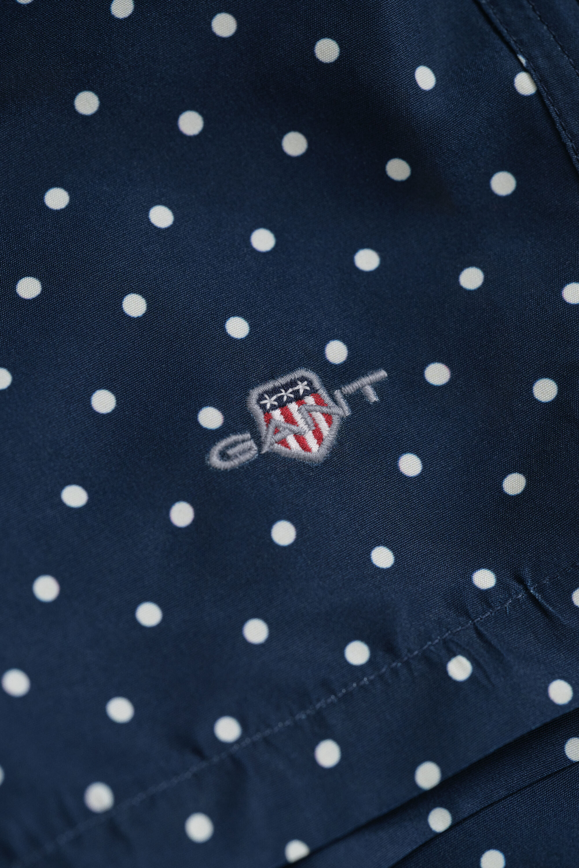 Pantaloncini da bagno con stampa a pois