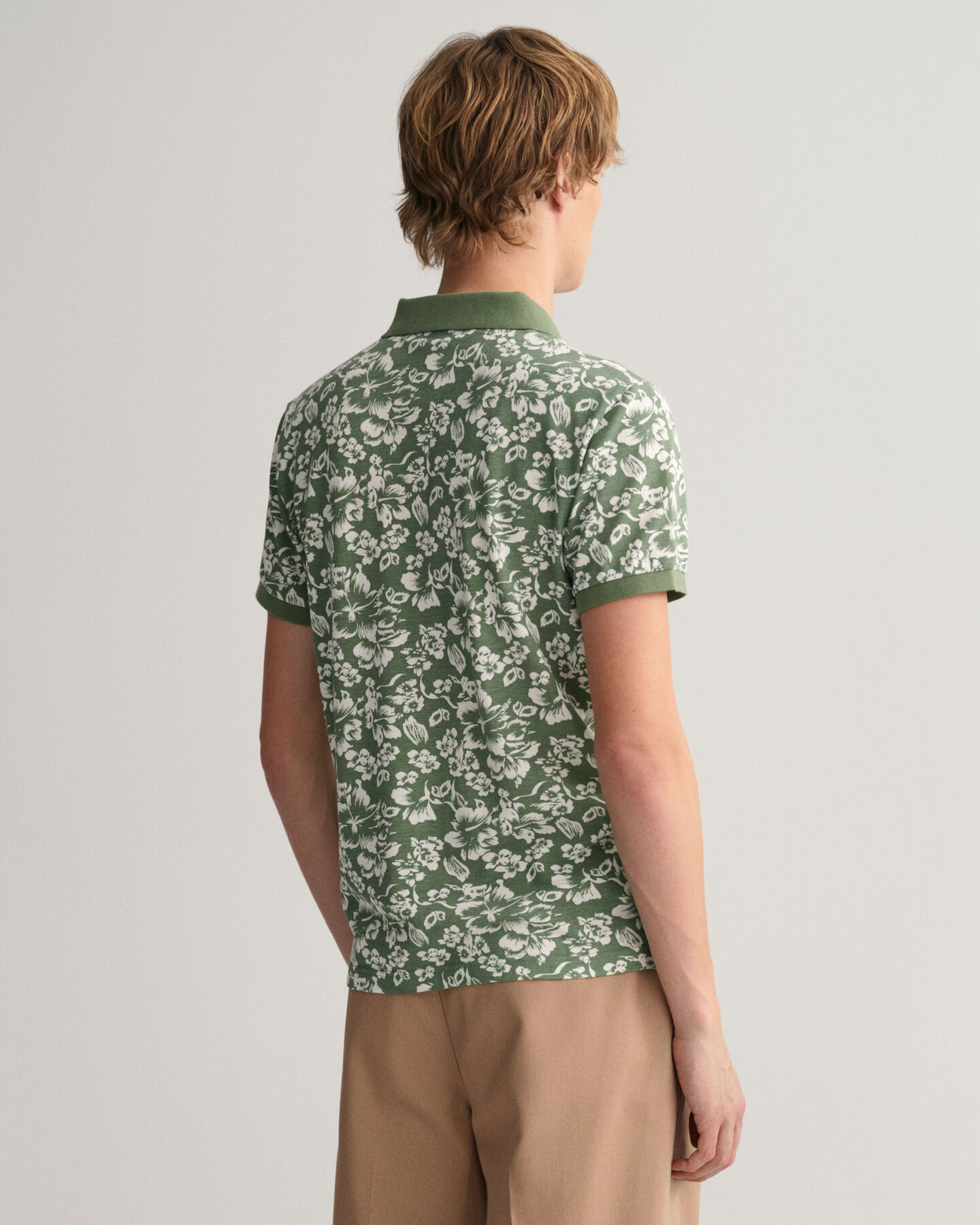 Piqu&eacute; Poloshirt mit floralem Print