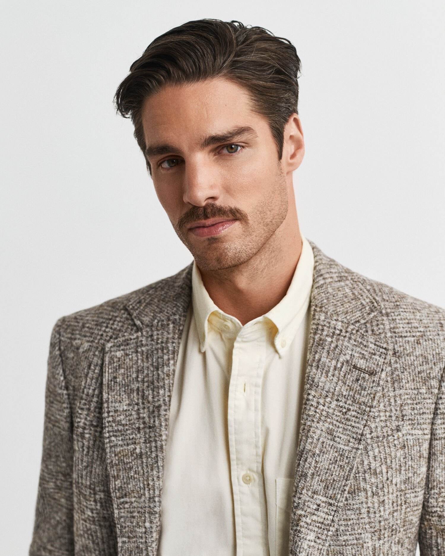 Veste blazer en maille à carreaux