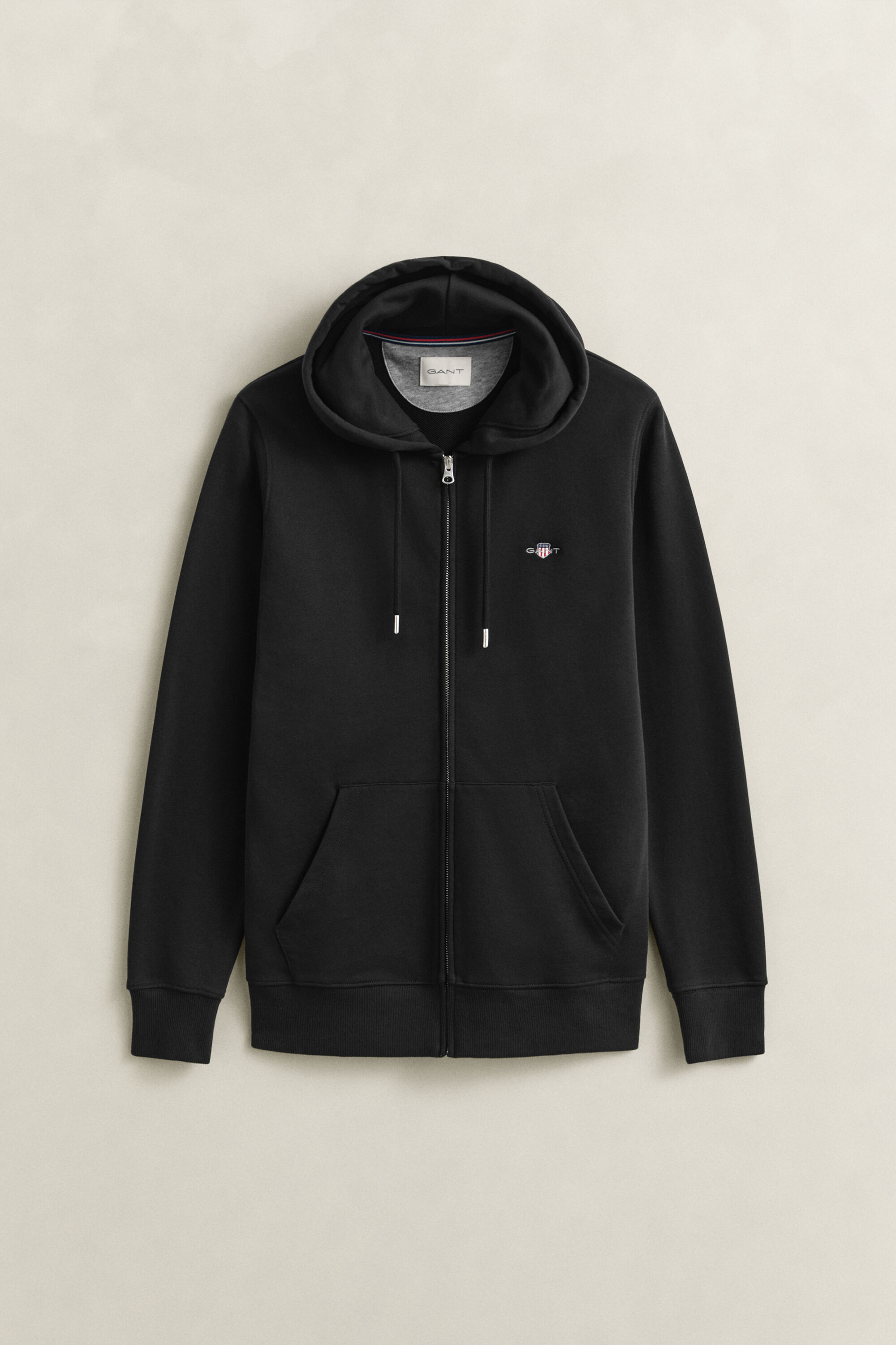 Sweat à capuche zippé avec écusson