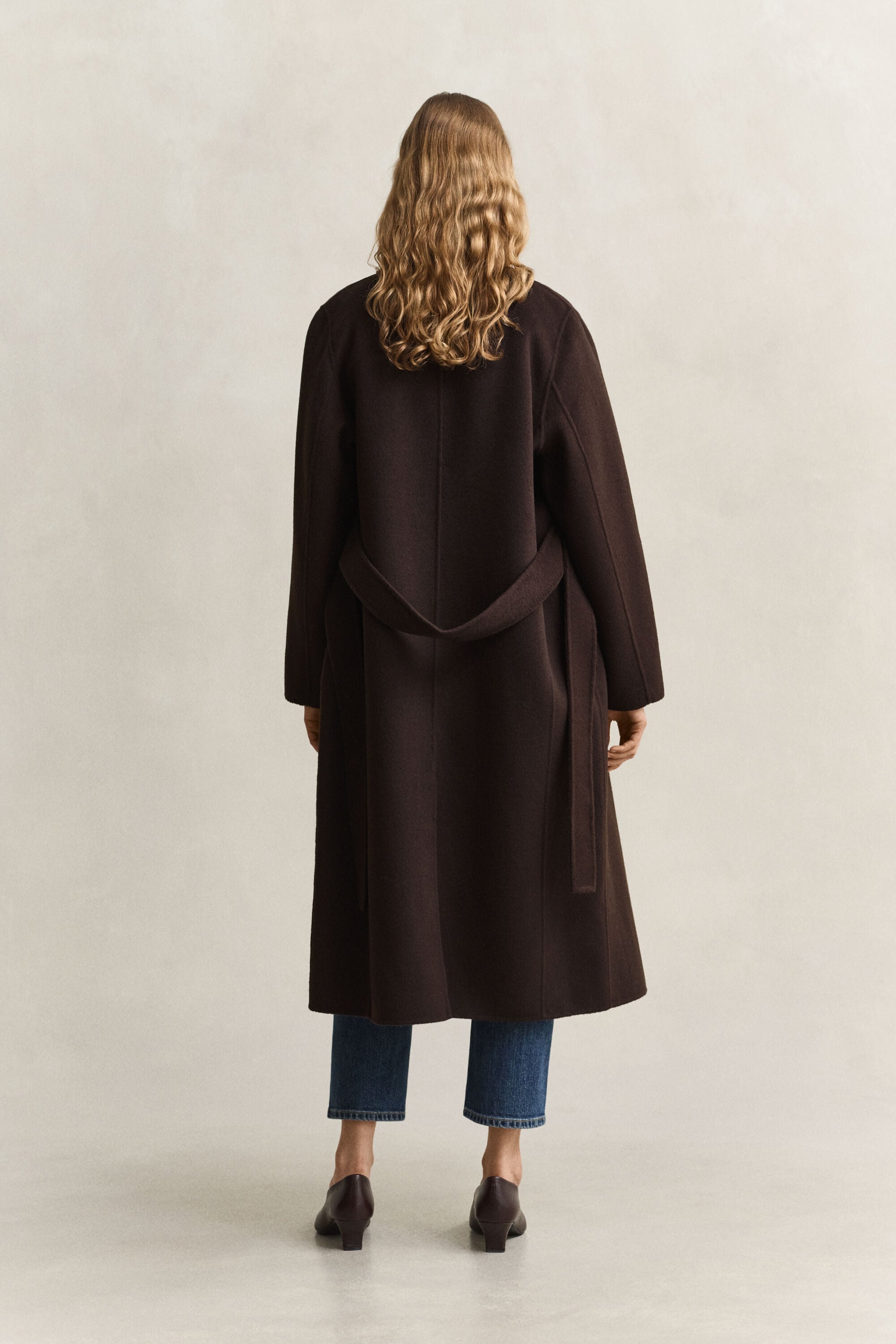 Manteau cousu main avec ceinture