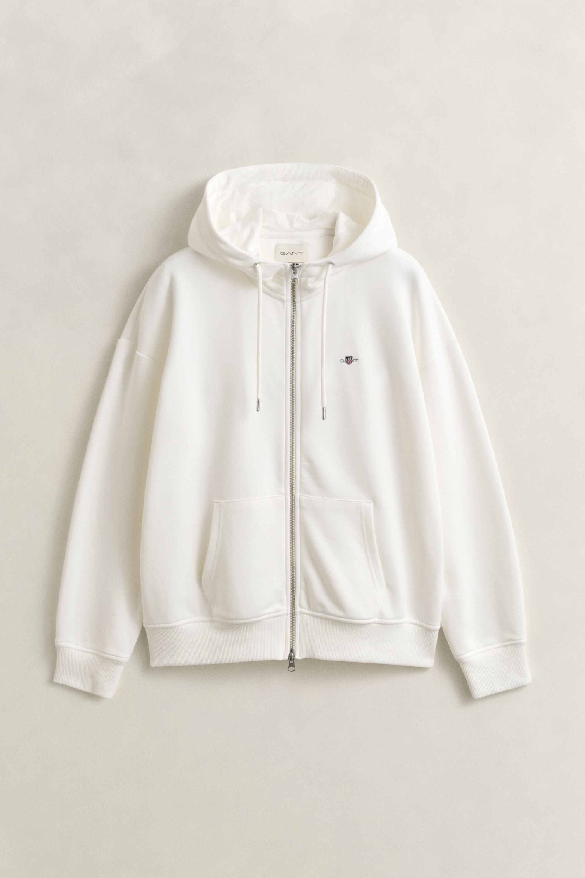 Sweat à capuche zippé avec écusson