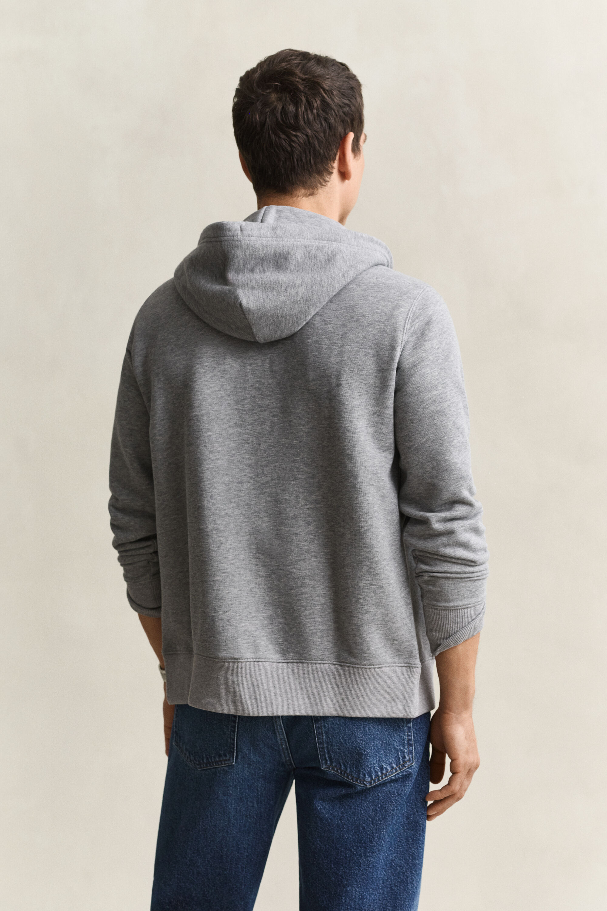 Sweat à capuche zippé avec écusson